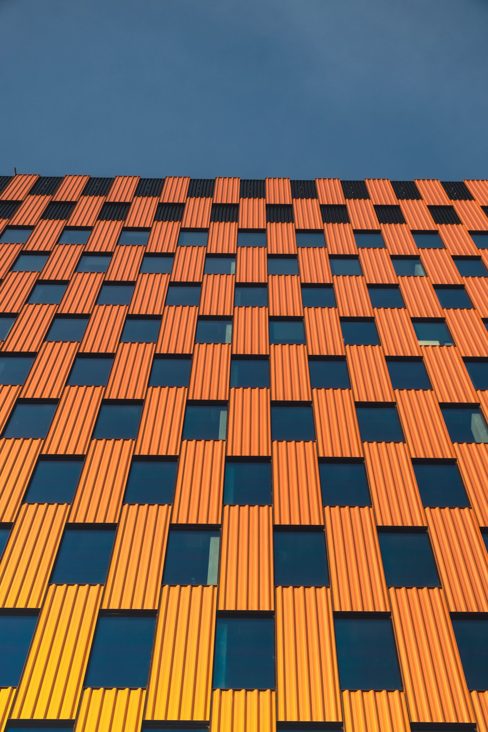 modern-office-building-exterior-with-glass-facade-2022-10-22-02-58-02-utc-min